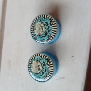 Skull gauges body jewelry